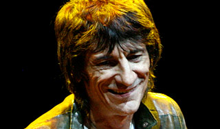 Гитарист Rolling Stones напал на россиянку Гитарист Rolling Stones напал на россиянку